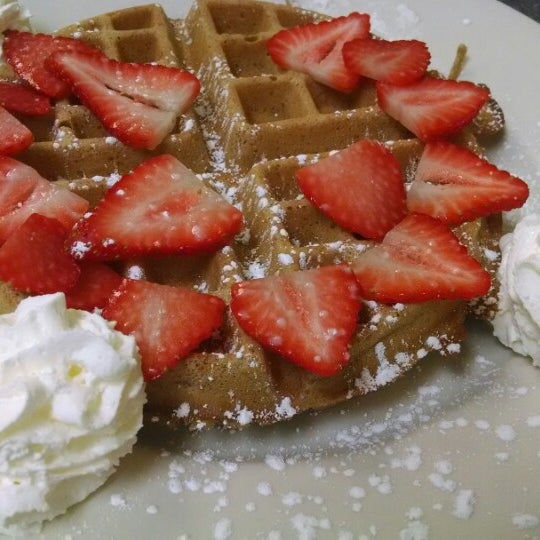 Photo taken at Omelette &amp; Waffle Café by Dren R. on 2/1/2014