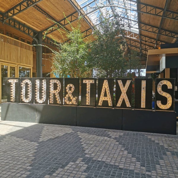 Photo taken at Tour &amp; Taxis by Michiel R. on 8/3/2022