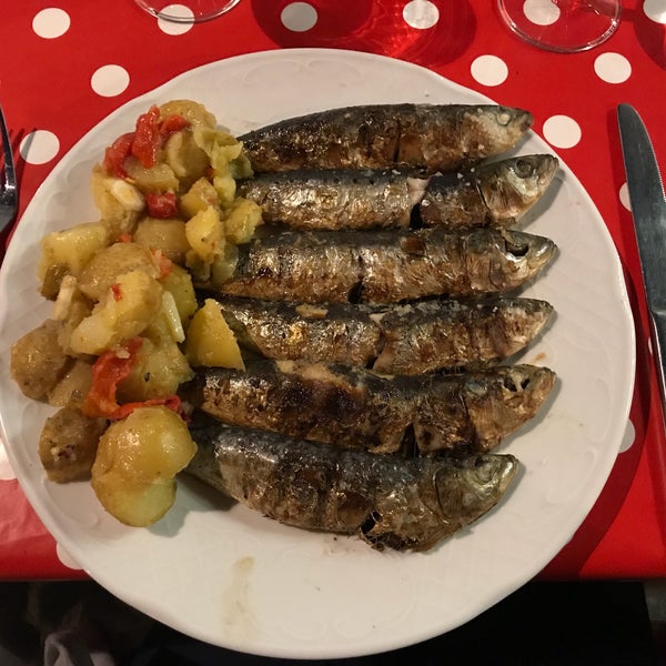 Nice mood, with seats outside in a small square & good service. I had grilled sardines-cooked very nice but had a bit too much salt. Some tapas, 2 mains, 2 desserts&2 glasses of wine came to €55