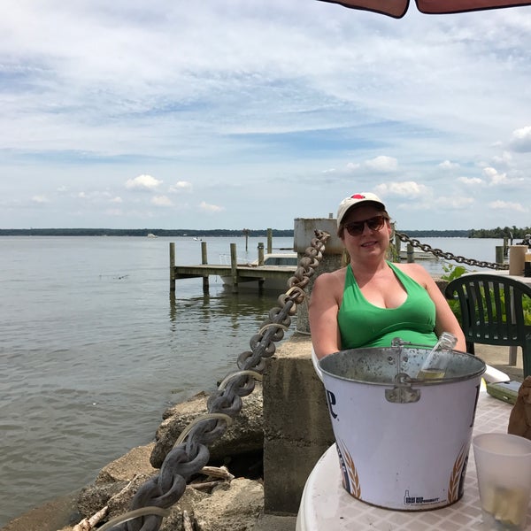 Photo taken at Tim&#39;s Rivershore Restaurant and Crabhouse by Dave S. on 7/3/2017