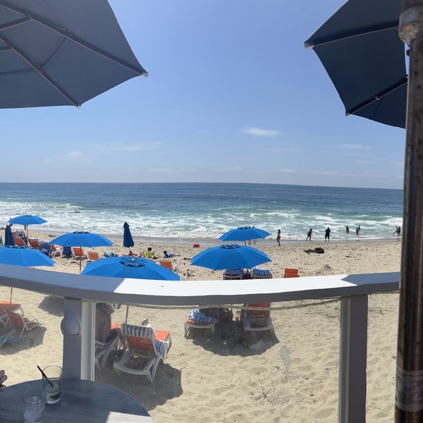 Photo taken at The Deck On Laguna Beach by Courtney J. on 5/7/2022