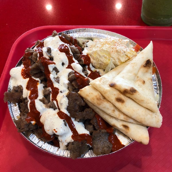 Photo taken at The Halal Guys by Patrick C. on 10/29/2018