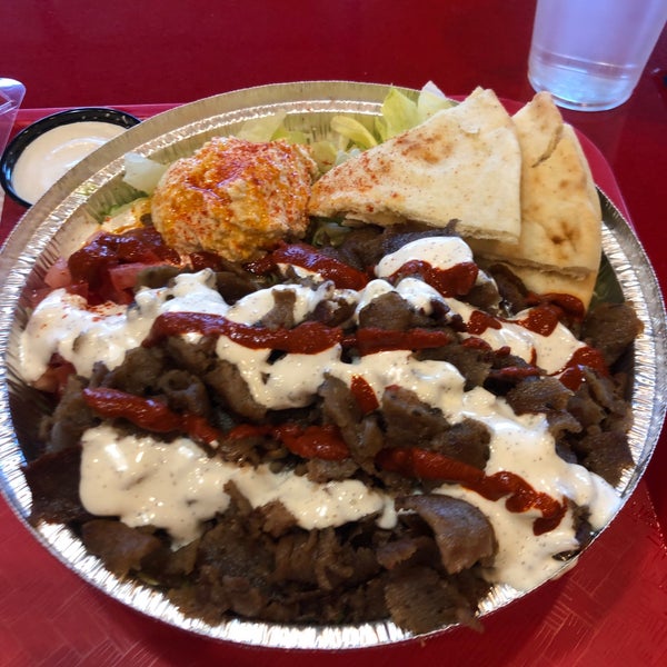 Photo taken at The Halal Guys by Patrick C. on 12/2/2018