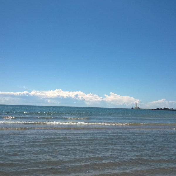 Photo taken at Cobourg Beach by Daria _. on 8/4/2015