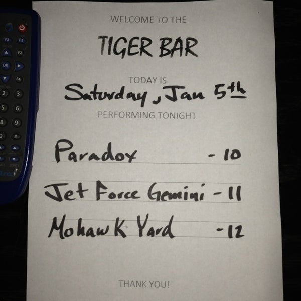 Photo taken at Tiger Bar by Lexie S. on 1/6/2013