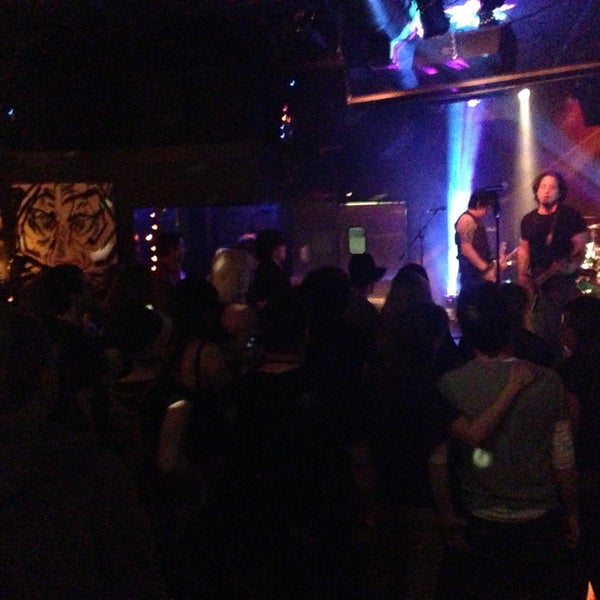 Photo taken at Tiger Bar by Lexie S. on 4/14/2013