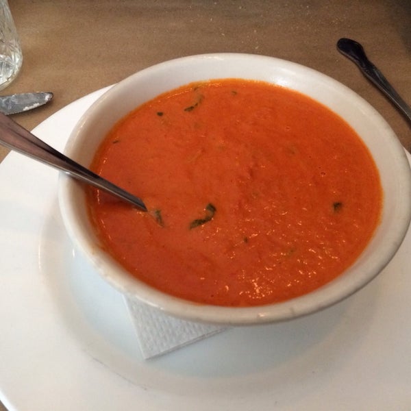 TOMATO CREAM SOUP: very thick, more like tomato chowder. big enough bowl to share as a starter.