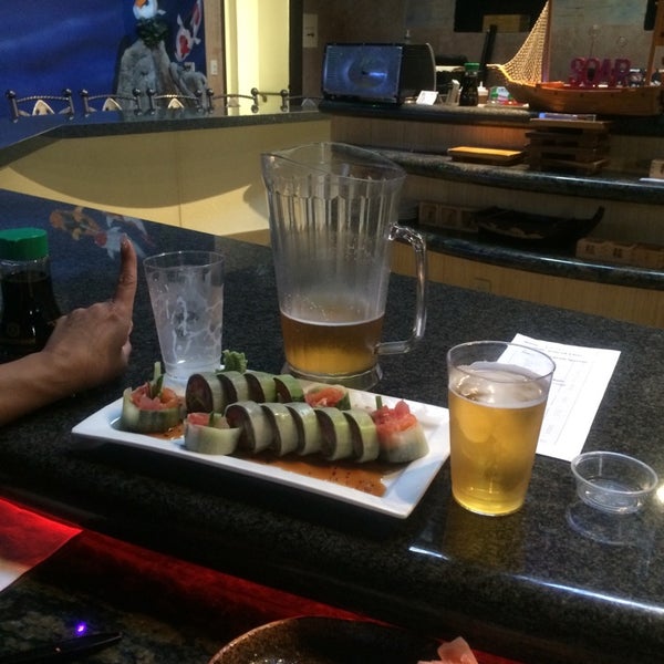 Photo taken at Sushi On A Roll by Dean H. on 3/13/2014