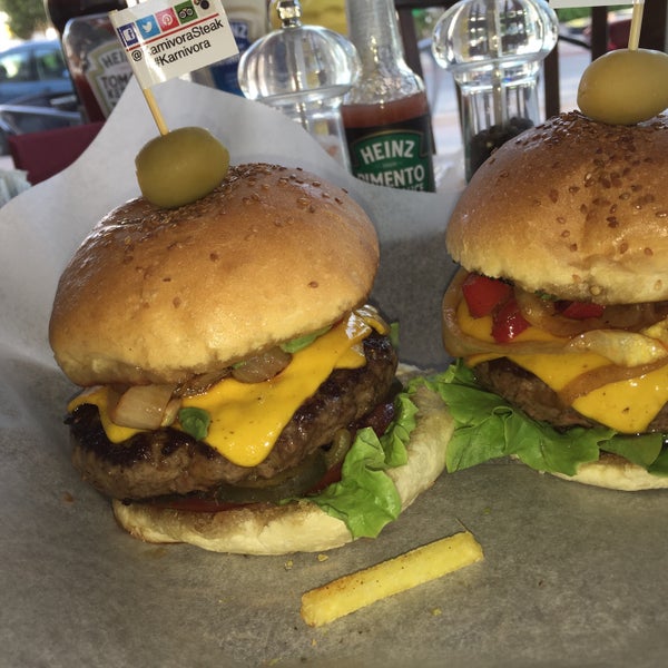 Photo taken at Karnivora Steak &amp; Burger House by Ahmet B. on 4/25/2015