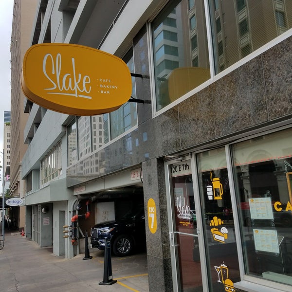 Photo taken at Slake Cafe &amp; Bar by Brian M. on 4/6/2018