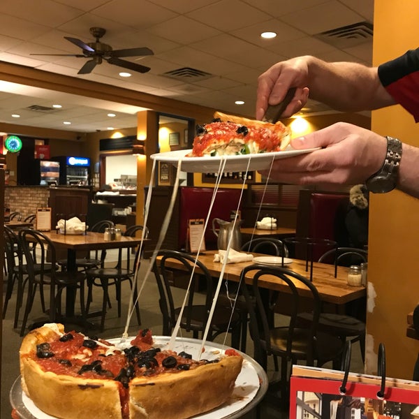 Photo taken at Giordano&#39;s by FATIMA on 3/6/2018