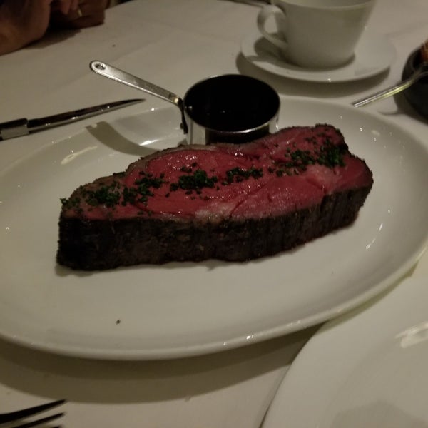 Photo taken at Alexander&#39;s Steakhouse by Kevan K. on 3/11/2019