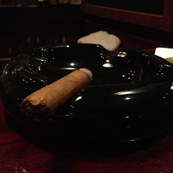 Photo taken at The Occidental Cigar Club by Ben S. on 7/13/2013