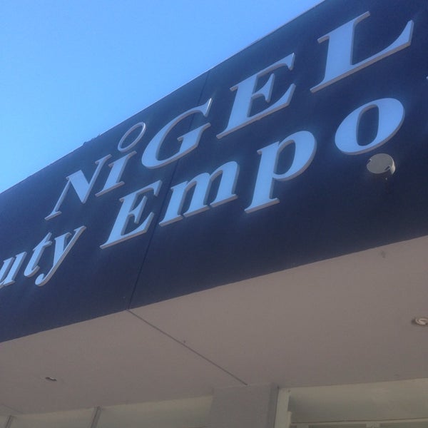 Photo taken at Nigel&#39;s Beauty Emporium by Anna C. on 7/3/2014