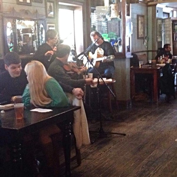 Photo taken at Dubh Linn Square Irish Pub by Phil J. on 3/17/2014