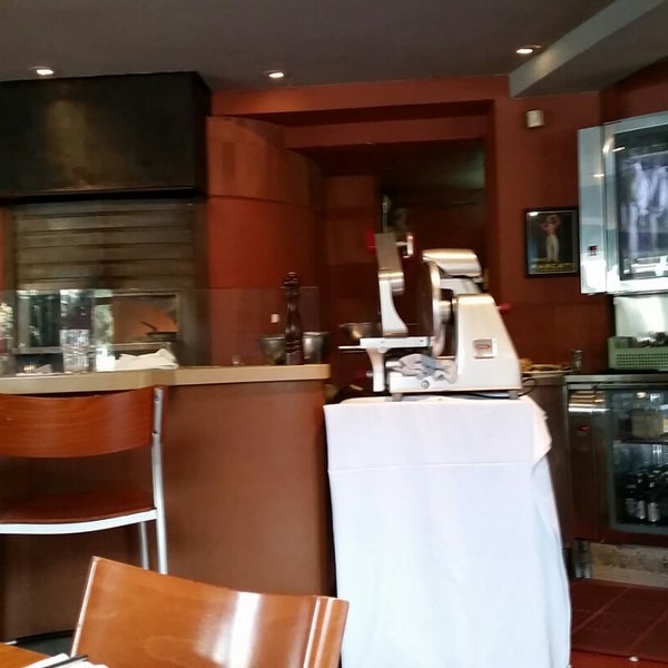 Photo taken at Oliveto Cafe &amp; Restaurant by Renato S. on 12/6/2014