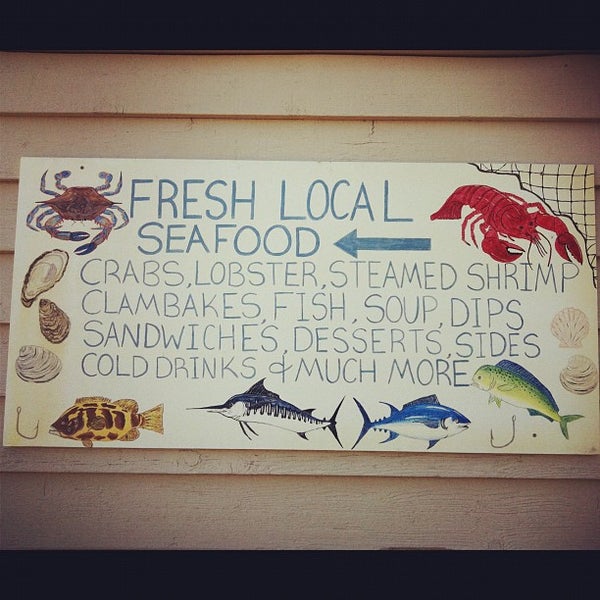 Foto tomada en Dockside N&#39; Duck Seafood Market  por Kelly B. el 7/18/2012