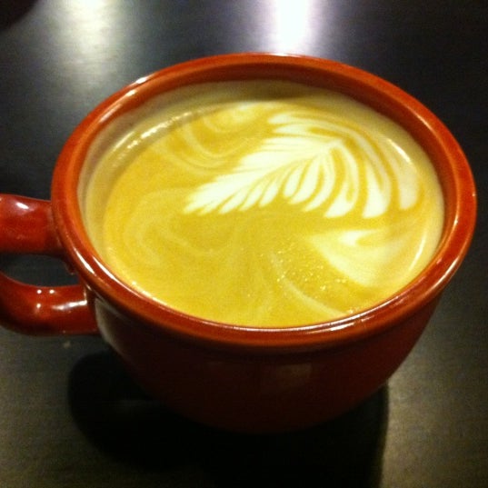 Photo taken at Roots Coffeehouse by Sonja &#39;QD&#39; D. on 2/11/2012