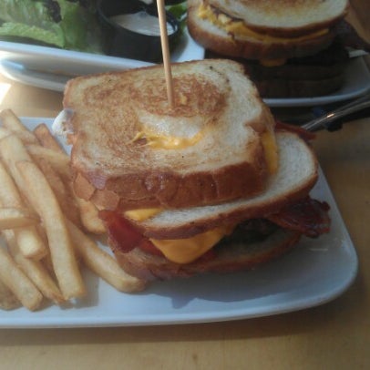 Photo taken at Crave Real Burgers by Andrew C. on 9/9/2012