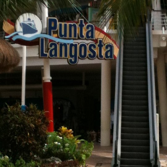 Photo taken at Punta Langosta by Leonel on 8/5/2012