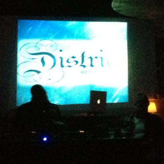 Photo taken at District Restaurant &amp; Lounge by Camille M. on 2/20/2012