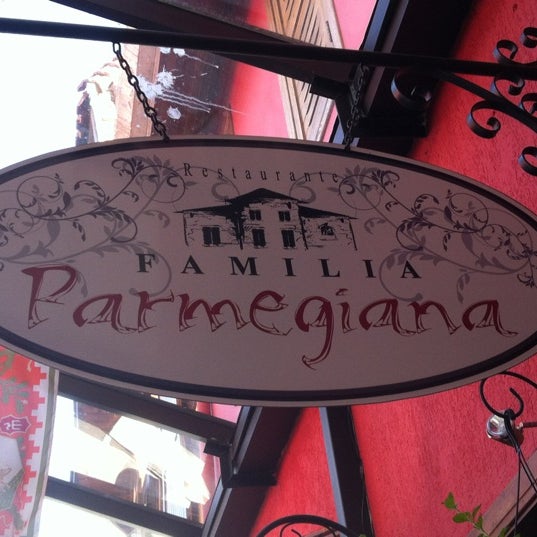 Photo taken at Familia Parmegiana by Luciano F. on 8/3/2012