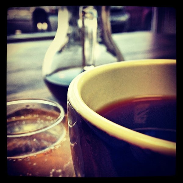 Photo taken at Evocation Coffee by Justin R. on 9/11/2012
