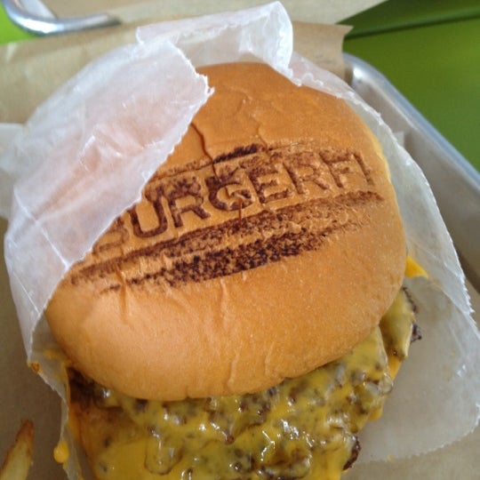 Photo taken at BurgerFi by Rachel on 8/13/2012