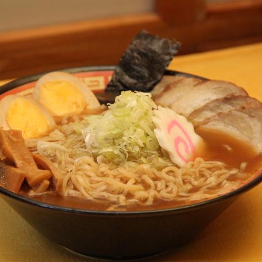 This is Shoyu Ramen.  About as traditional as Japanese ramen gets; a dark soy sauce based soup. (hosomen, nori, menma, boiled egg, naganegi, chashu, naruto)
