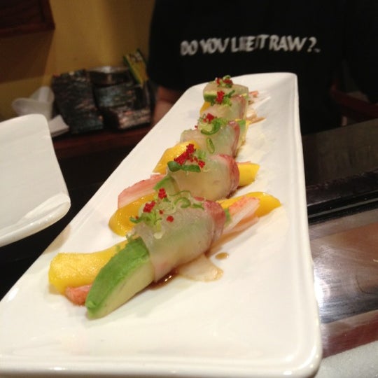 Photo taken at Makiman Sushi by Lucia D. on 2/22/2012