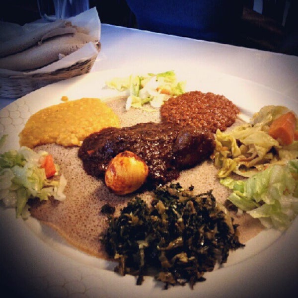 Photo taken at Messob Ethiopian Restaurant by Hanh on 8/26/2012