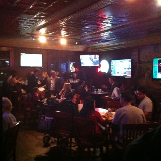 Photo taken at Knuckles Sports Bar by Josh on 2/26/2012