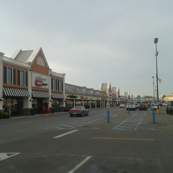 Photo taken at Tanger Outlet Gonzales by Juanma C. on 3/18/2015