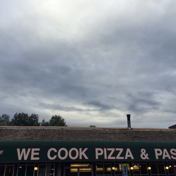 Photo taken at We Cook Pizza and Pasta by Katie B. on 7/31/2015