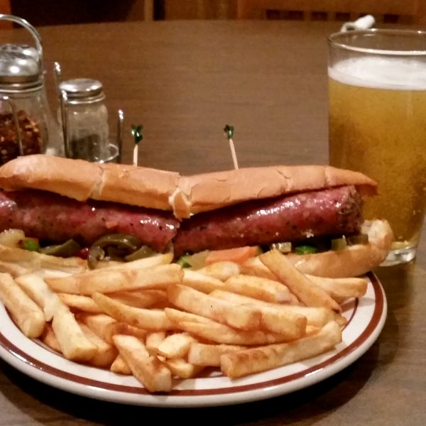 New special: 10" Italian Sausage sub. Delis and very filling. Shown with Spicy Fries, giardinara, and an ice cold Bud.