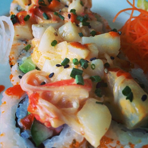 Photo taken at Yumm Thai : Sushi and Beyond by Paul V. on 10/11/2014