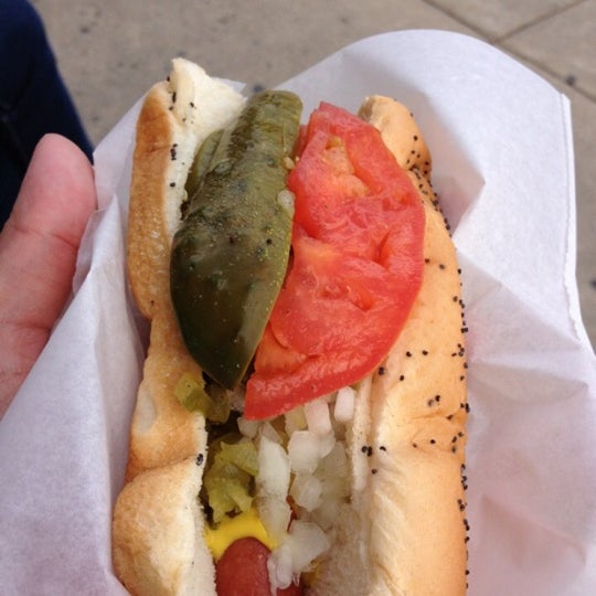 Photo taken at Kim &amp; Carlo&#39;s Chicago Style Hot Dogs by Jason D. on 10/12/2013