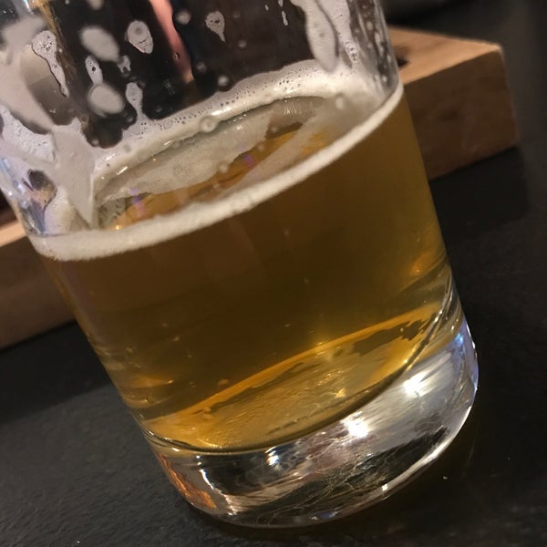 Photo taken at Upland Brewing Company Tasting Room by Ashley T. on 1/27/2019