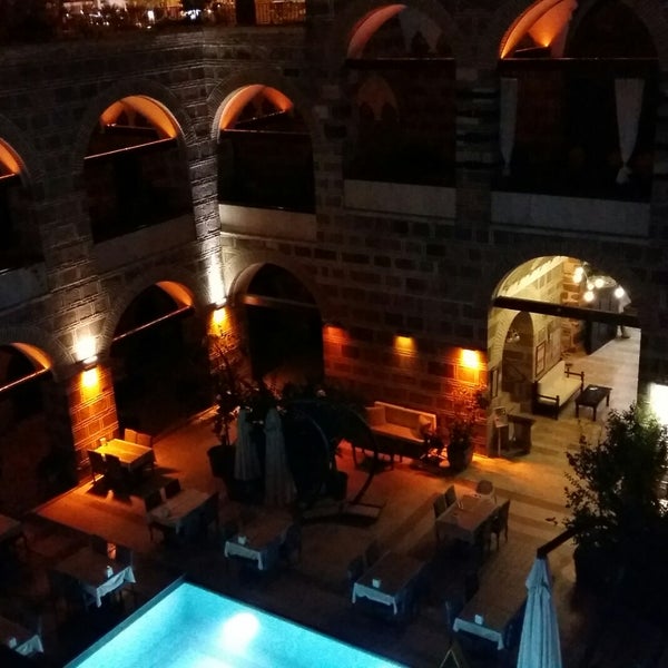 Photo taken at Kanuni Kervansaray Historical Hotel by Belkıs G. on 8/21/2018