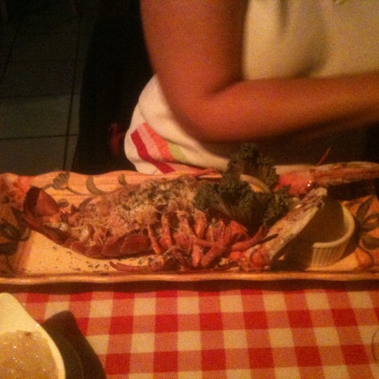Photo taken at Lobster Pot Restaurant by Guilherme B. on 3/28/2013