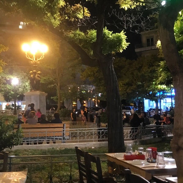 Sit outside at the square to experiment the street life at night.