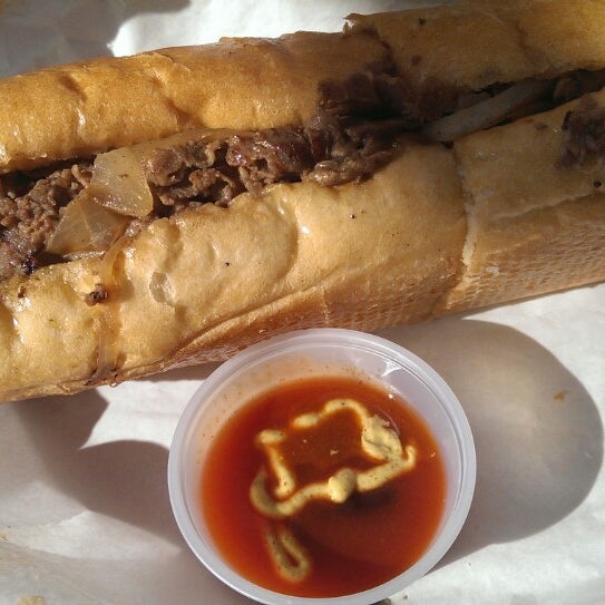 Photo taken at Busters Cheesesteak by Lingy M. on 1/17/2014