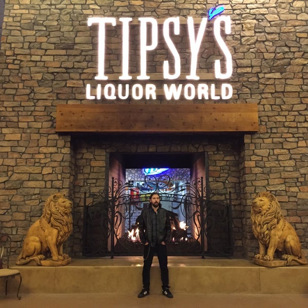 Photo taken at Tipsy&#39;s Liquor World by Justin G. on 1/7/2015