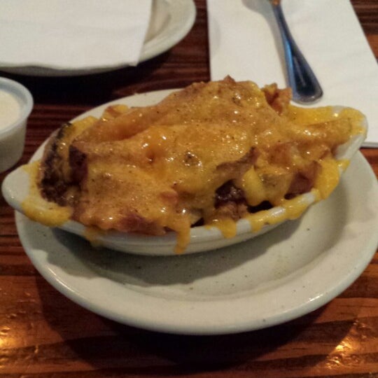 Photo taken at Snuffers by Michael R. on 5/25/2014