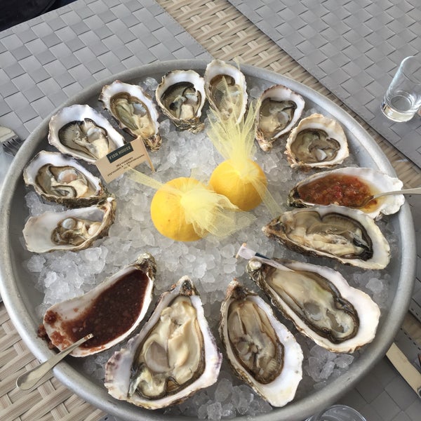 Photo taken at FISH HOUSE Oyster Bar &amp; Restaurant by Julia G. on 5/28/2017