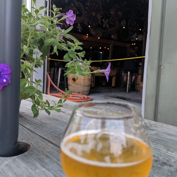 Photo taken at Four Quarters Brewing by Julie M. on 7/14/2019