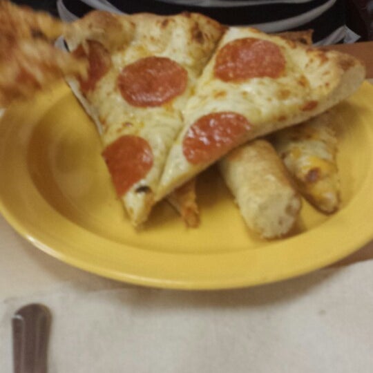 Photo taken at Cicis by Diego O. on 1/4/2014