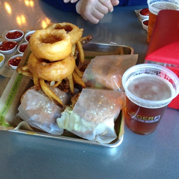 Photo taken at BurgerFi by Phil A. on 3/9/2014