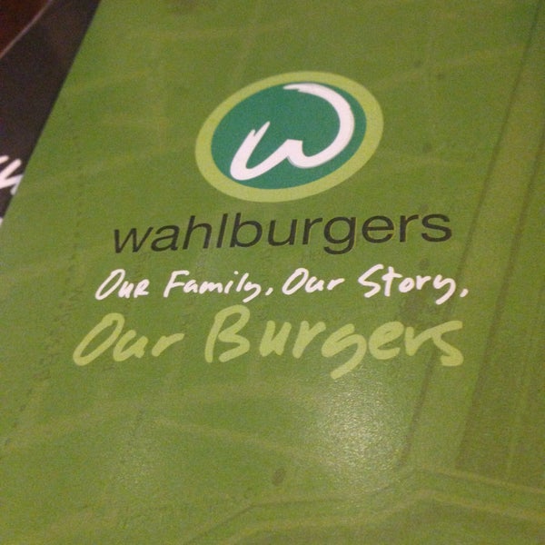 Photo taken at Wahlburgers by Claudia S. on 2/14/2015