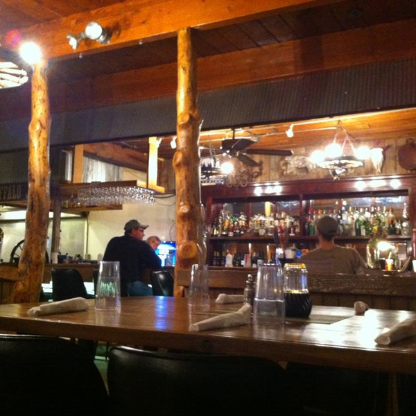Photo taken at Buffalo Jump Saloon &amp; Steakhouse by Kathleen O. on 2/22/2014
